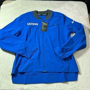 Nike UCONN Women’s Basketball Jacket Blue Zipper Pockets and Zips on Side Size M